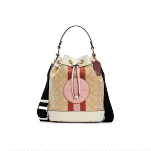 COACH DEMPSEY DRAWSTRING BUCKET BAG IN SIGNATURE JACQUARD WITH STRIPE AND PATCH